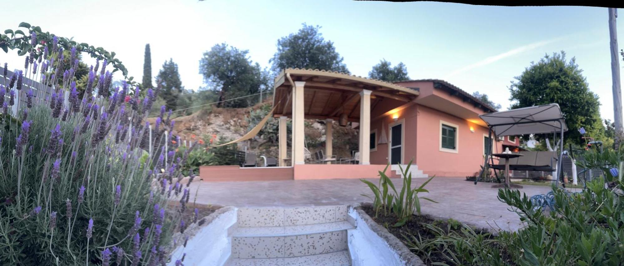 Nikos' Home Gastouri  Luaran gambar
